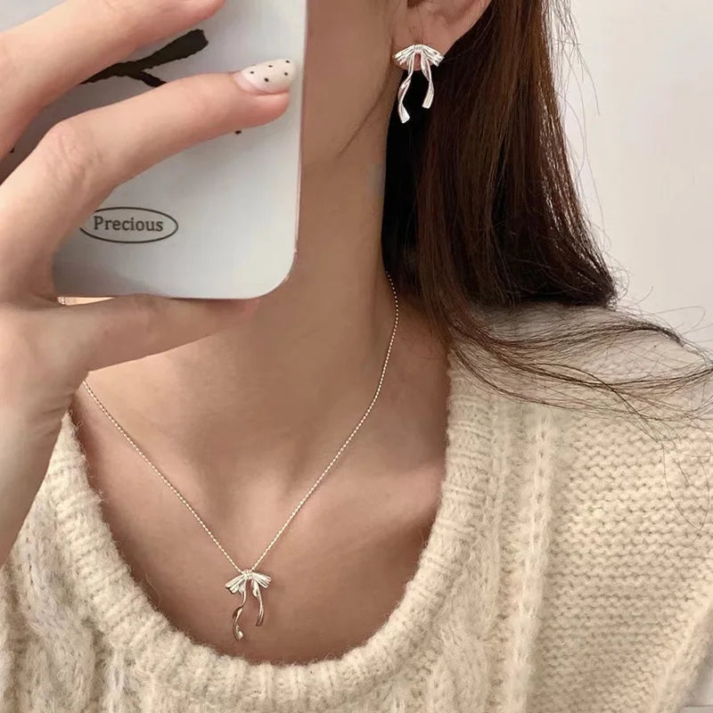 PANJBJ 925 Sterling Silver Bow Knot Earring for Women Texture Tassels Sweet Romantic Korean Jewelry Gift Dropshipping